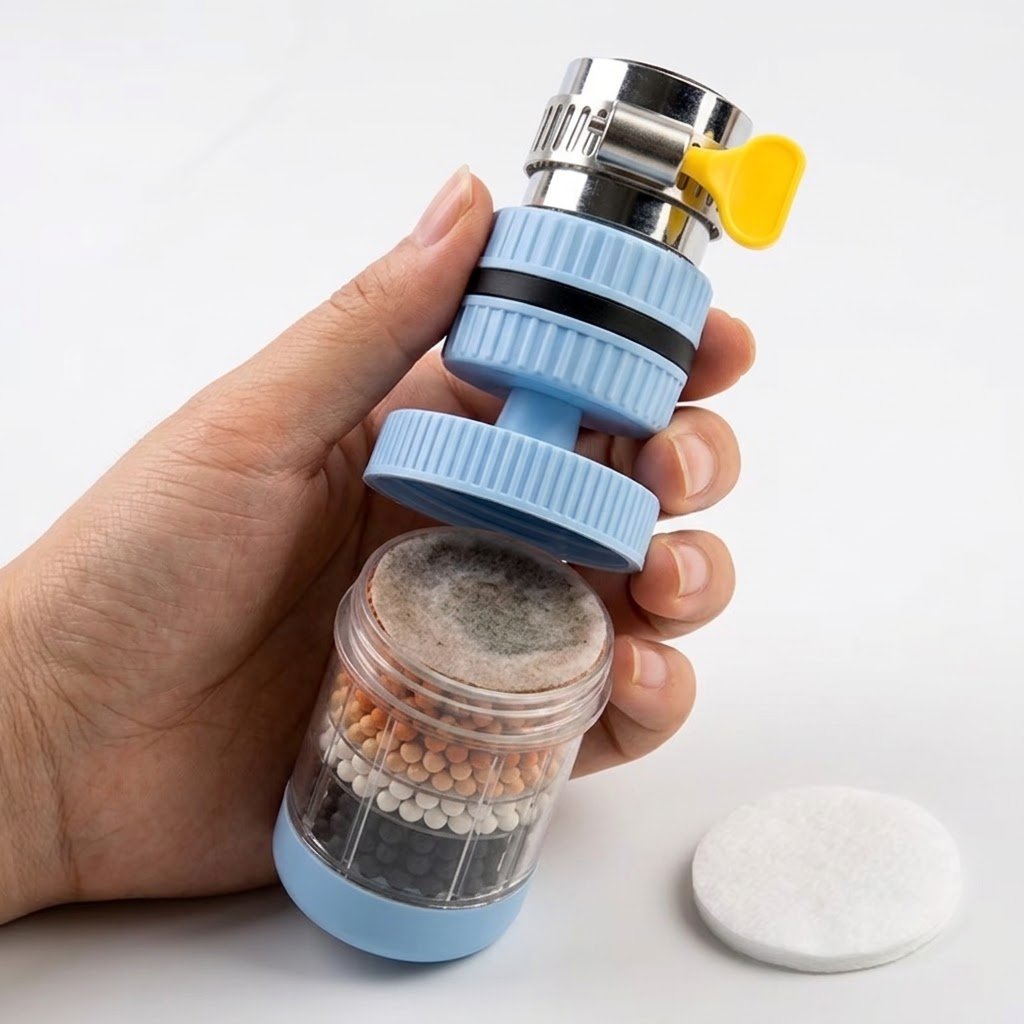 Zibby filter opened showing the used cotton layer next to a fresh replacement pad