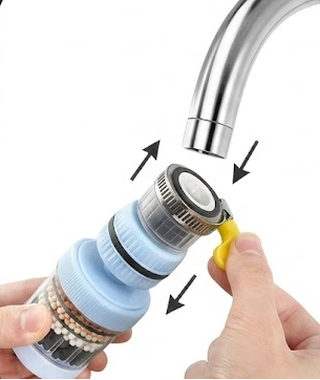 Clipping the Zibby filter onto a kitchen faucet